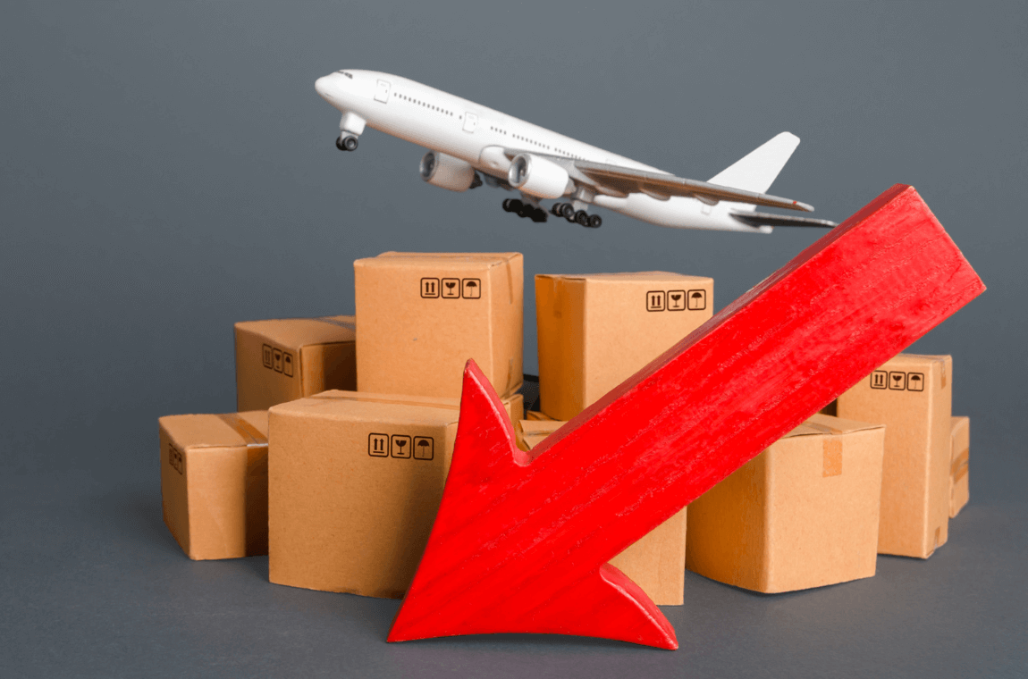Toy airplane flying over parcels with a large red arrow pointing downward, depicting the goal of reducing delivery delays.